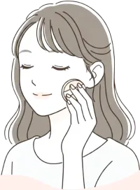 女性がファンデーションを肌に塗っている画像